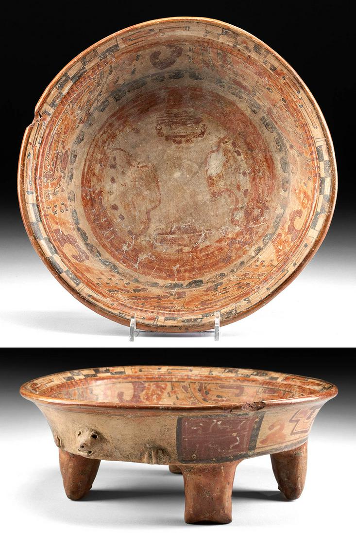 Maya Ulua Valley Polychrome Tetrapod Bowl: Pre-Columbian, Maya Territories, Guatemala, Ulua Valley, Late Classic Period, ca. 600 to 900 CE. A delightful pottery dish presenting a flat bottom and shallow basin with thick walls that flare outwar