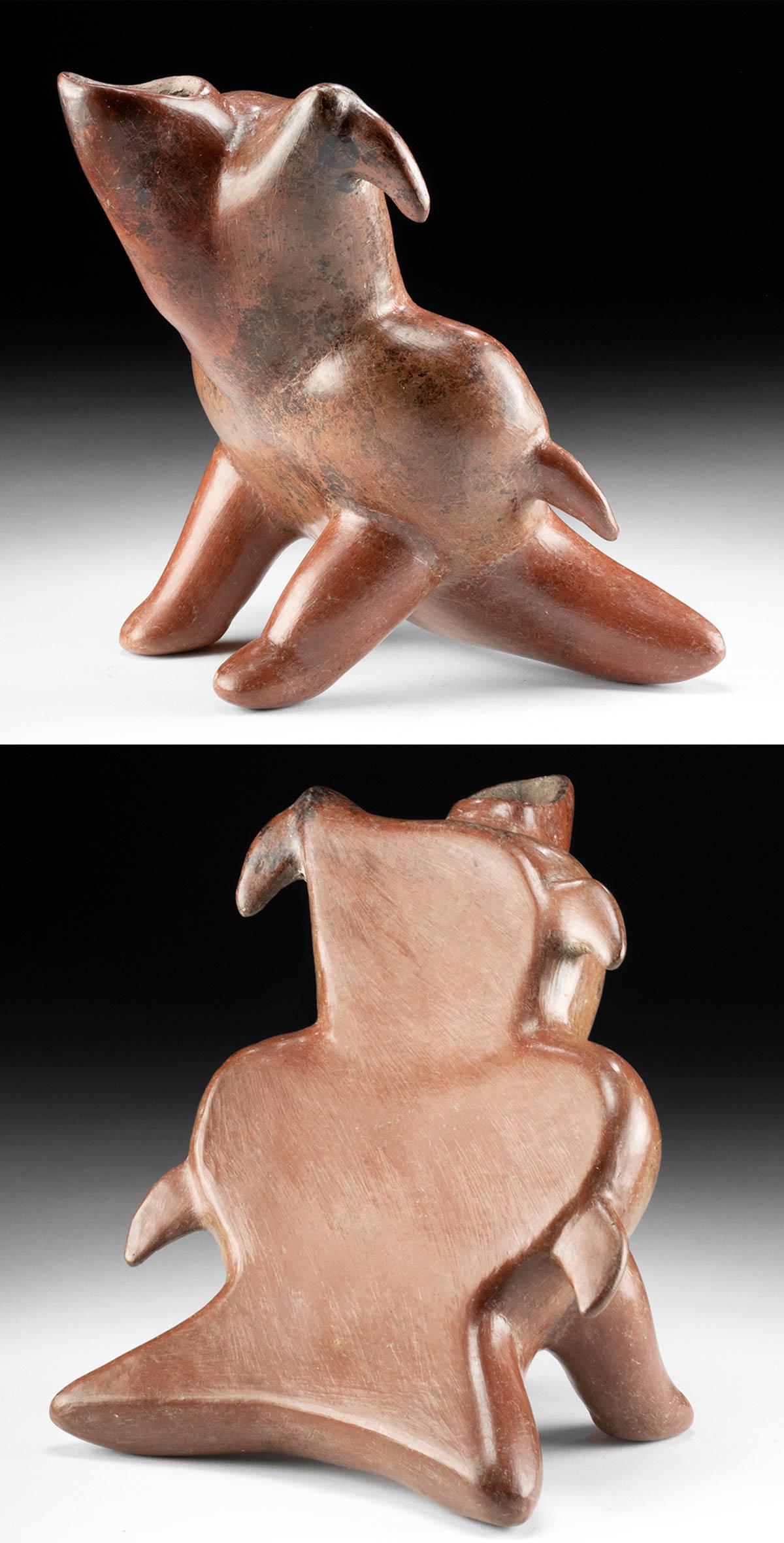 Colima Redware Reclinatorio Abstract Zoomorph: Pre-Columbian, West Mexico, Colima, Protoclassic Period, ca. 100 BCE to 250 CE. A hand-built redware pottery reclinatorio vessel of an intriguing, abstract form exhibiting a sloped backrest that is su