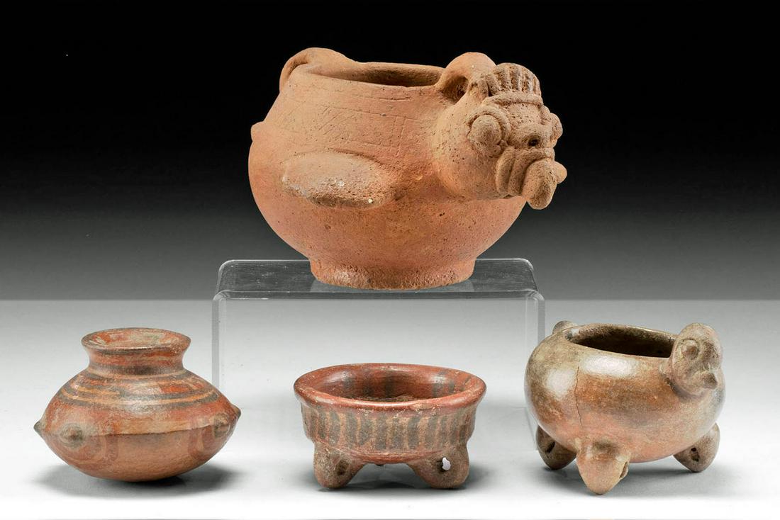 4 Costa Rican Redware Vessels - 2 Avian Form: Pre-Columbian, Central America, Costa Rica, Atlantic Watershed, ca. 300 to 700 CE. An attractive ensemble of 4 pottery vessels, all enveloped in vibrant red slip. First, the largest vessel presents a