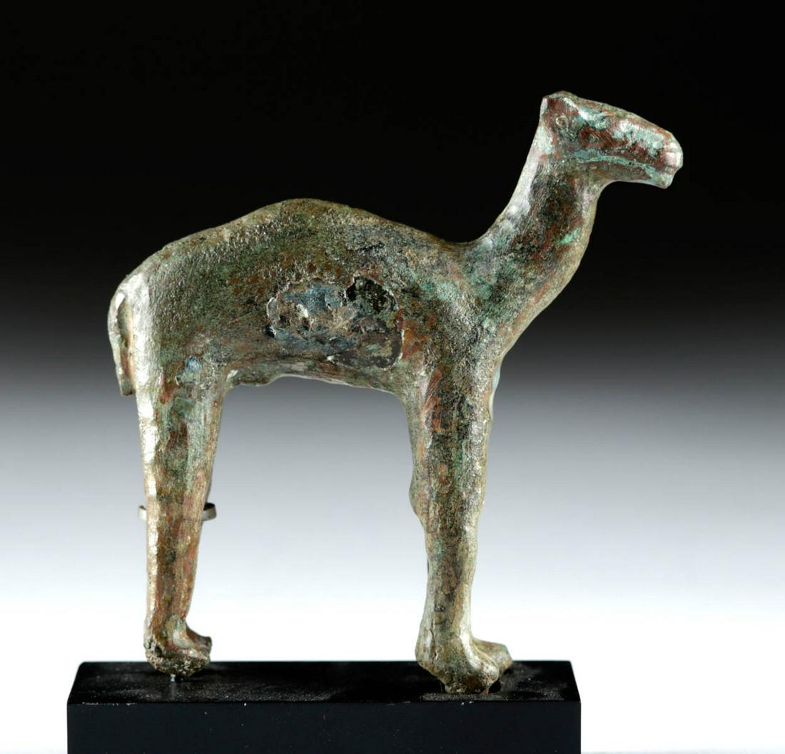 Ancient South Arabian Leaded Copper Camel: **Originally Listed At $400** Ancient South Arabia, Yemen, ca. early first millennium BCE. A cast leaded-copper statuette of a camel with an erect head and neck, a slight hump, lengthy legs with delin