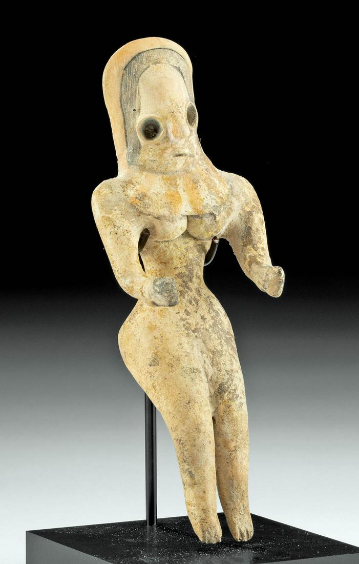 Indus Valley Mehrgarh Pottery Fertility Idol, TL Tested: **First Time At Auction** Ancient Central Asia, Indus Valley, Mehrgarh culture, ca. 3500 to 2800 BCE. A hand-built pottery female fertility idol of a characteristically abstract form with slender limb