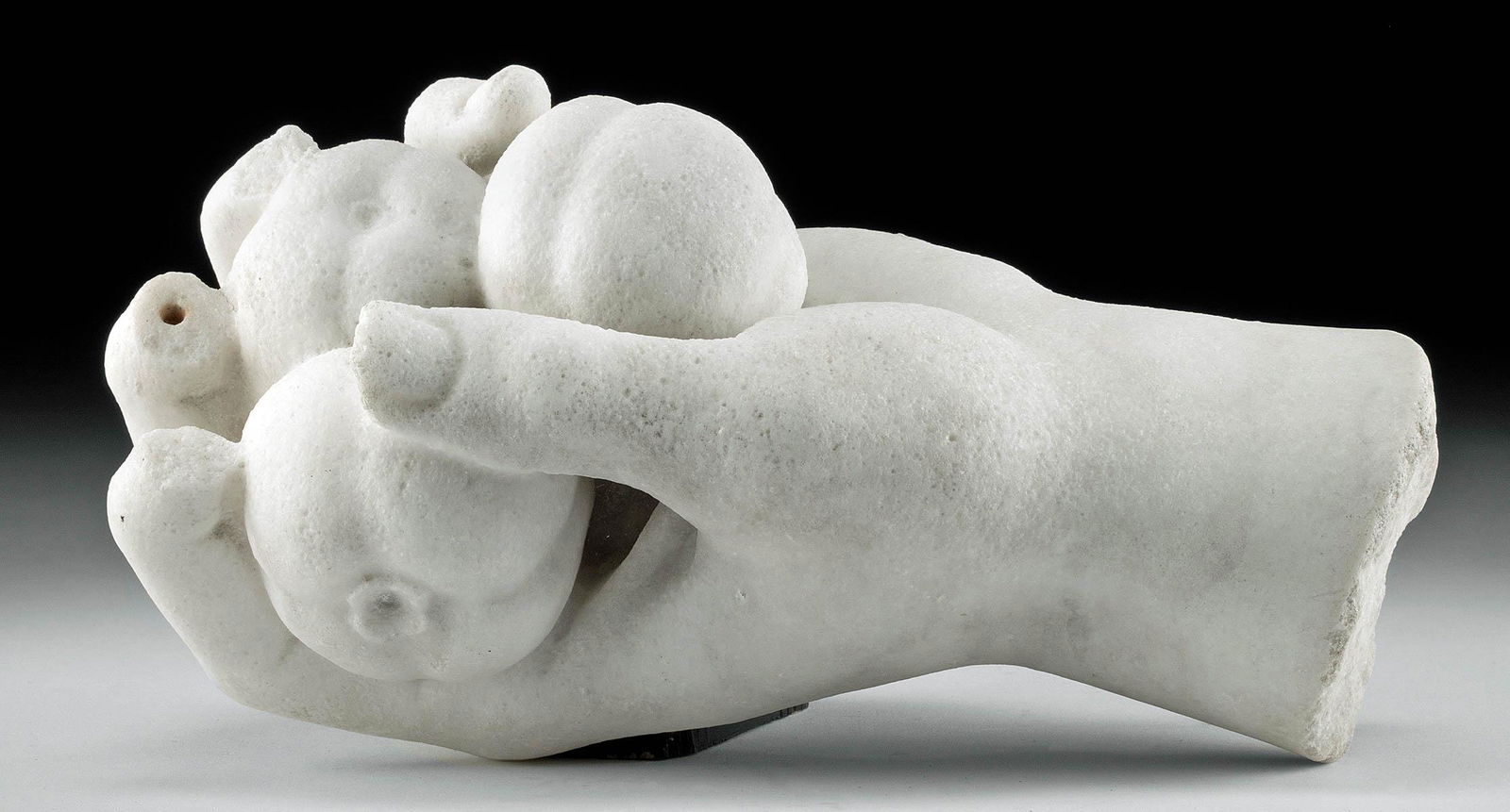 Roman Marble Hand w/ Pomegranates, ex-Quinn: ** A portion of the proceeds from the sale of this artwork will be donated to the Anthony Quinn Foundation, whose mission is to advocate for the important role arts education plays in personal develop