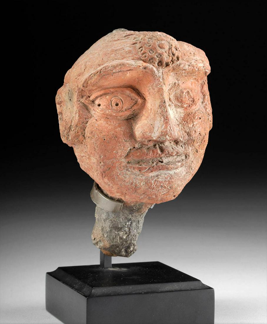 12th C. Indonesian Majapahit Pottery Head - ex Quinn: ** A portion of the proceeds from the sale of this artwork will be donated to the Anthony Quinn Foundation, whose mission is to advocate for the important role arts education plays in personal develop