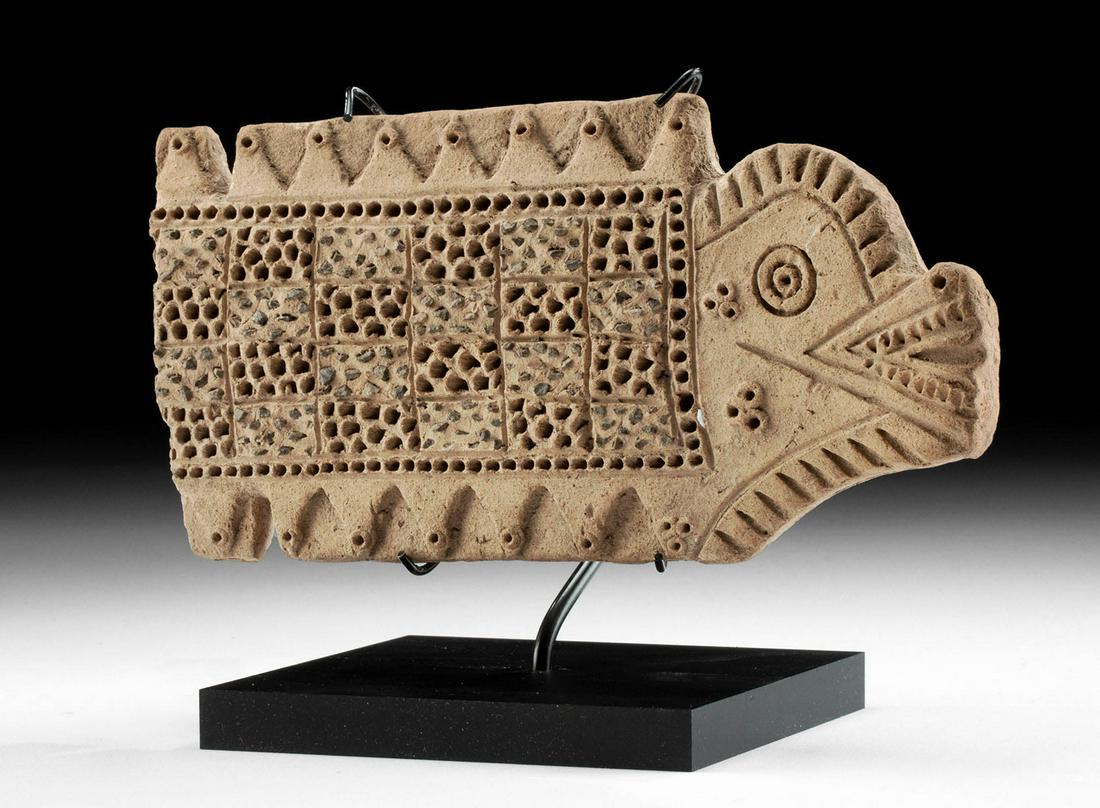 Tumaco La Tolita Pottery & Stone Fish Grater Crocodile: Pre-Columbian, Colombia and Ecuador, La Tolita (sometimes Tumaco), ca. 600 BCE to 200 CE. A hand-built pottery effigy grater, or rollador, in the shape of a zoomorphic creature with a corrugated surfa