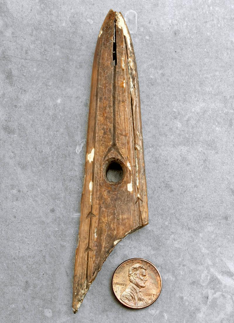 Ancient Alaskan Bering Sea Bone or Antler Harpoon Head: Native American, Northwestern United States, Alaska, Beringian / Old Bering Sea Culture, ca. 200 BCE to 1000 CE. This is a hand carved whale or walrus bone or caribou antler harpoon head of an elongat