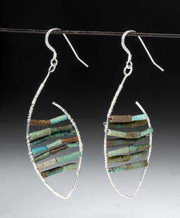 Silver Teardrop Earrings w/ Egyptian Faience Beads (pr): **First Time At Auction** Ancient Egypt, Late Dynastic to Ptolemaic periods, ca. 664 to 30 BCE. A beautiful pair of hammered silver earrings with distinctive fish-like forms. The interior of each