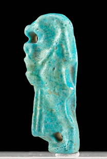 Egyptian Glazed Faience Pendant of Qebehsenuef: **Originally Listed At $250** Egypt, Late Dynastic to Ptolemaic Period, ca. 664 to 30 BCE. A beautiful and lustrous blue faience pendant showing the falcon-headed deity Qebehsenuef in profile. The