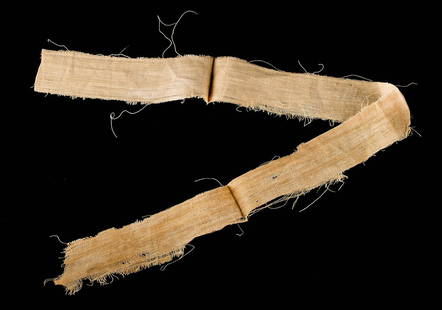 Egyptian Late Dynastic Mummy Wrapping Long Section: **Originally Listed At $150** Ancient Egypt, Late Dynastic Period, 26th to 31st Dynasty, ca. 664 to 332 BCE. A long section of a mummy wrapping; a textile piece of interwoven fibrous threads. The