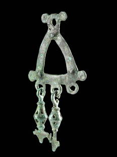 Greek Geometric Bronze Votive Bell Ornament: **Originally Listed At $350** Greece, Geometric Period, ca. 8th to 7th century CE. A cast bronze openwork panel decorated with circles and dangling bells. The upper pendant is composed of a