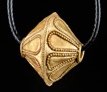 Eastern Greek Gold Bead w/ Granulated Floral Motifs: **Originally Listed At $250** Eastern Greece, ca. 6th to 4th century BCE. A stunning Greek gold bead of a perfectly symmetrical composition. The conical bead presents with granules arranged in a large