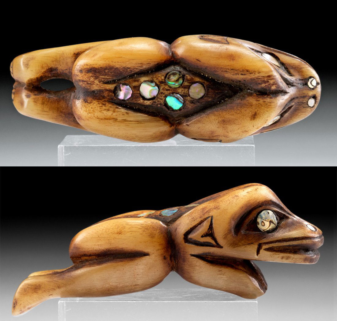 19th C. Tlingit / Haida Horn Amulet - Frog Form, Nacre Inlay: Native American, Pacific Northwest Coast, United States or Canada, Tlingit or Haida people, ca. 19th century CE. An adorable frog amulet carving made from horn of a bighorn sheep. The back, eyes, and