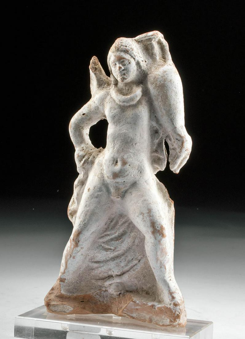 Canosan Terracotta Eros with Amphora: Magna Graecia, Southern Italy, Apulia, Canosa, ca. 4th to 3rd century BCE. A wonderful Canosan winged Eros (Roman Cupid), assuming a dynamic pose with outstretched legs, one slightly before the other 