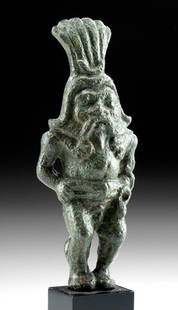 Rare Romano-Egyptian Leaded Bronze Bes Figure: Egypt, Romano-Egyptian Period, ca. 1st to 3rd century CE. A striking example of a cast-leaded-bronze figure depicting Bes, the dwarf deity who watches over the household, particularly the women and