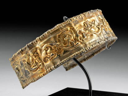 Elegant Greek Hellenistic Electrum Repousse Diadem: Eastern Mediterranean, Greece, Hellenistic period, ca. 3rd to 2nd century BCE. A stunning electrum diadem with an extraordinary repousse decoration across the obverse face. The rectangular sheet was h