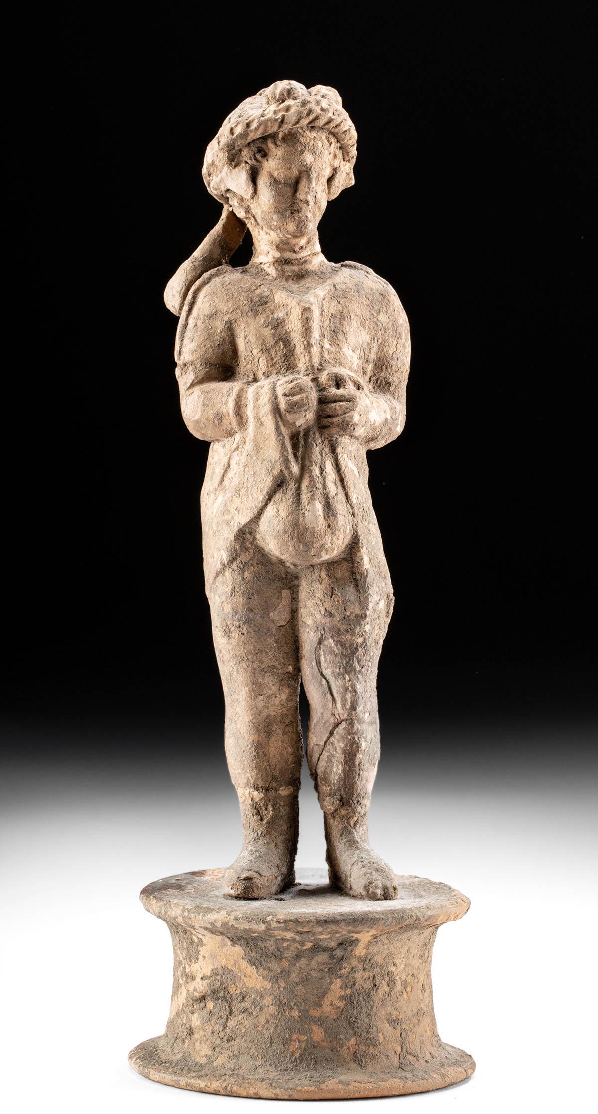 Greek Hellenistic Terracotta Standing Youth w/ Sack (1 of 5)