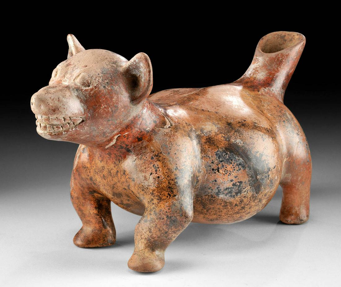 Colima Redware Vessel - Standing Dog Form: **First Time At Auction** Pre-Columbian, West Mexico, Colima, ca. 300 BCE to 300 CE. A beautifully constructed, hand-built redware dog vessel of a charming form that exhibits a playful nature and smoo