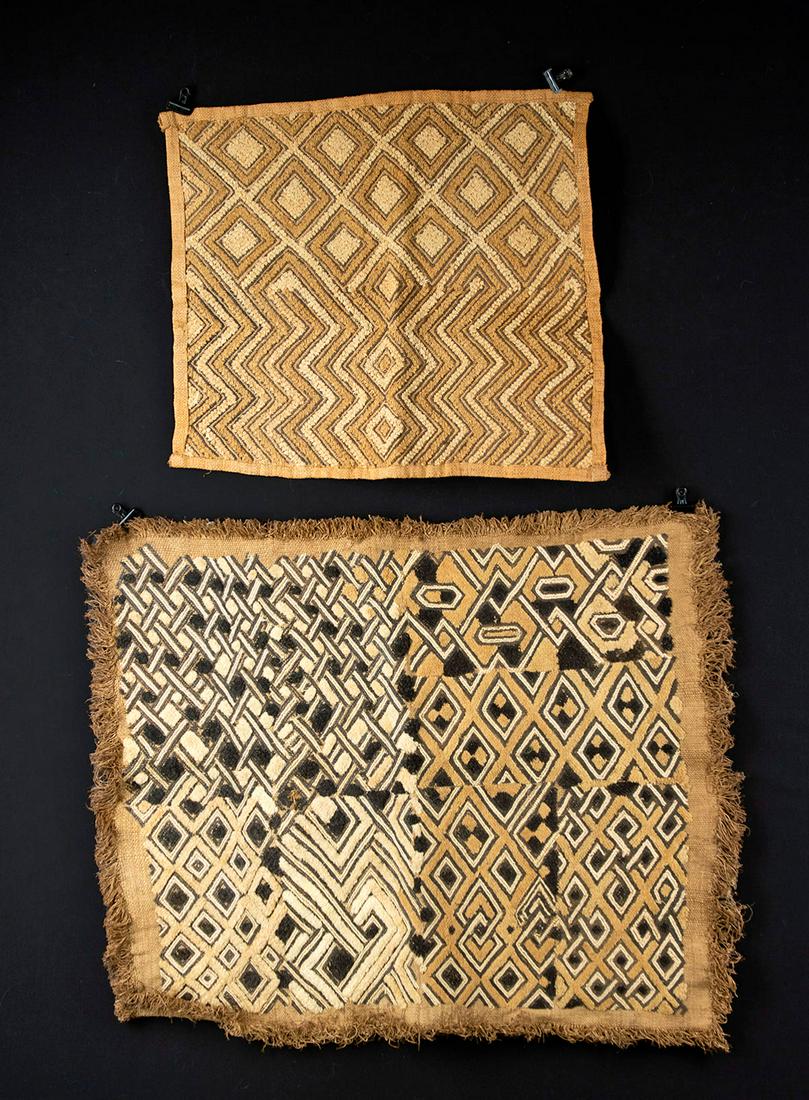 Lot of 2 Mid 20th C. African Kuba Cloths: **Originally Listed At $150** Central Africa, Democratic Republic of the Congo, Kuba, ca. mid 20th century CE. A pair of finely woven Kuba cloths, both presenting bold geometric patterns in warm earth