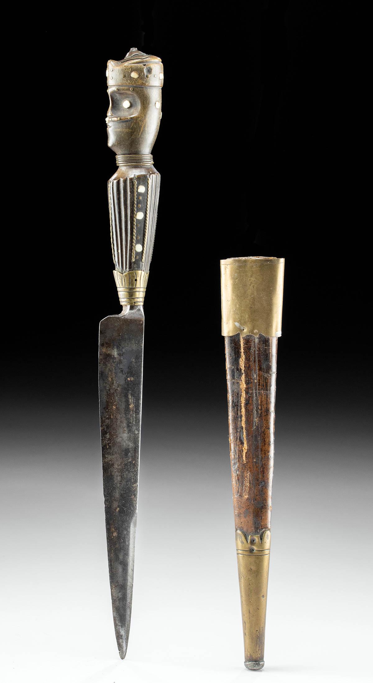 18th C. European Carbon Steel "Intarsiertes" Knife: **Originally Listed At $400** Western Europe, possibly Belgium, ca. end of 18th century CE. A rare single-edged carbon steel knife featuring a figural wooden hilt and a wood and brass sheath. Showcasi