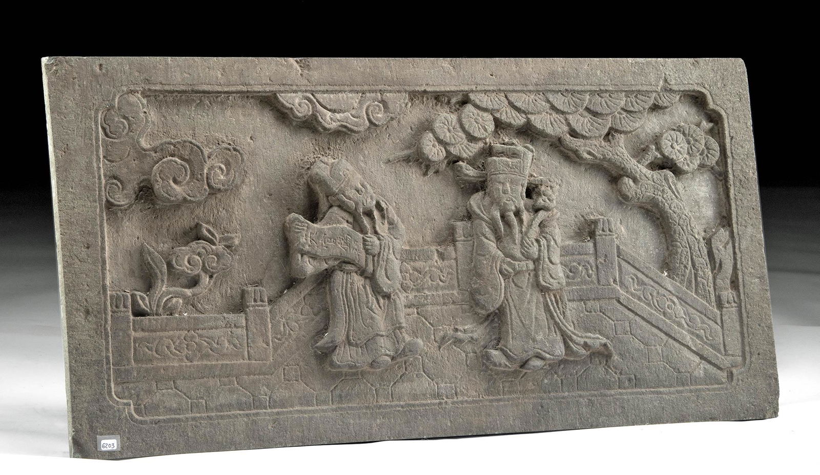 Large Chinese Ming Stone Panel w/ Scholars in Garden: East Asia, China, Ming Dynasty, ca. 1368 to 1644 CE. This is a large granite stone slab depicting a pair of robed figures in a courtyard carved in low relief upon a rectangular face. The slab was perh