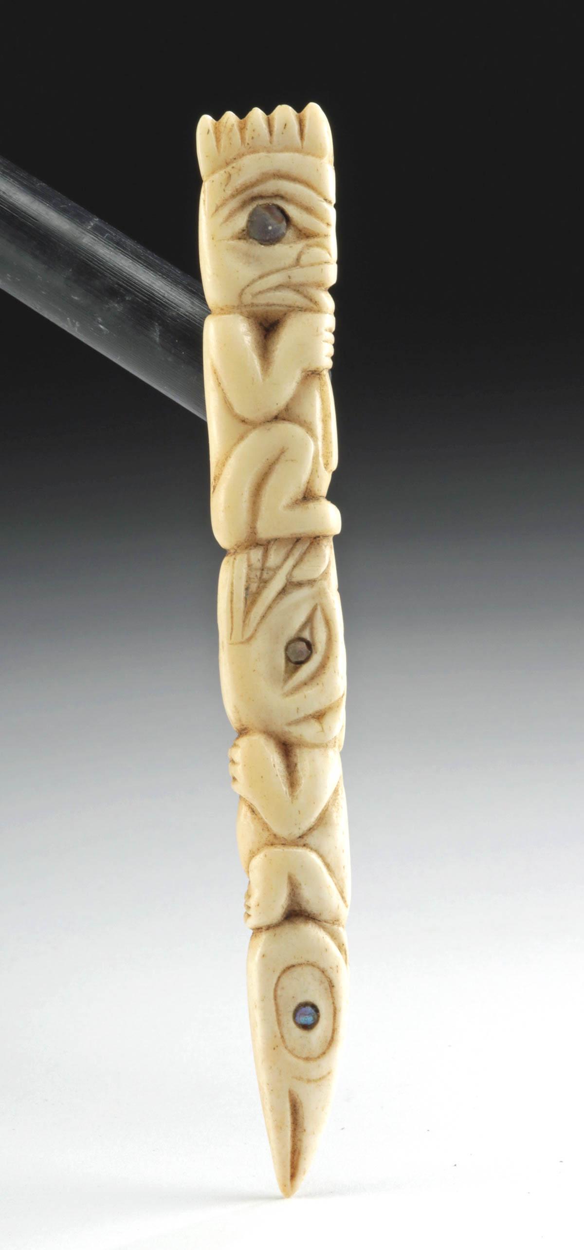 Haida / Tlingit Bone Totem Pendant Nacre Inlays: Native American, Pacific Northwest Coast, United States or Canada, Tlingit or Haida people, ca. mid-20th century CE. A fine marine mammal bone totem pendant carved into 3 stacked zoomorphic and anthro