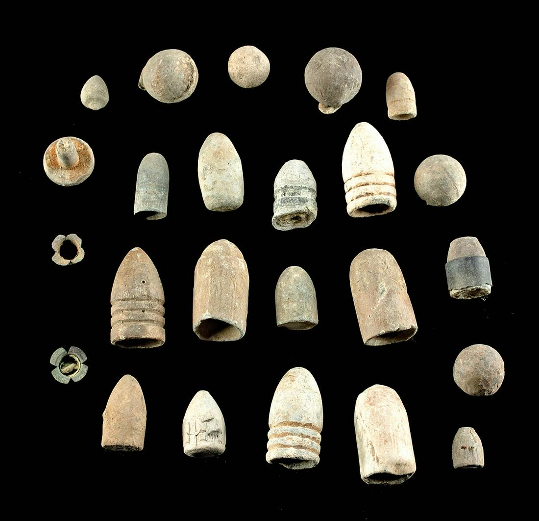 19th C. USA Civil War Lead Bullets + Musket Balls (24): North America, Eastern United States, Civil War era, ca. 1861 to 1865 CE. A wonderful and historical gathering of Civil-War-era projectiles: 2 percussion caps, 5 musket balls, 16 bullets, and a single