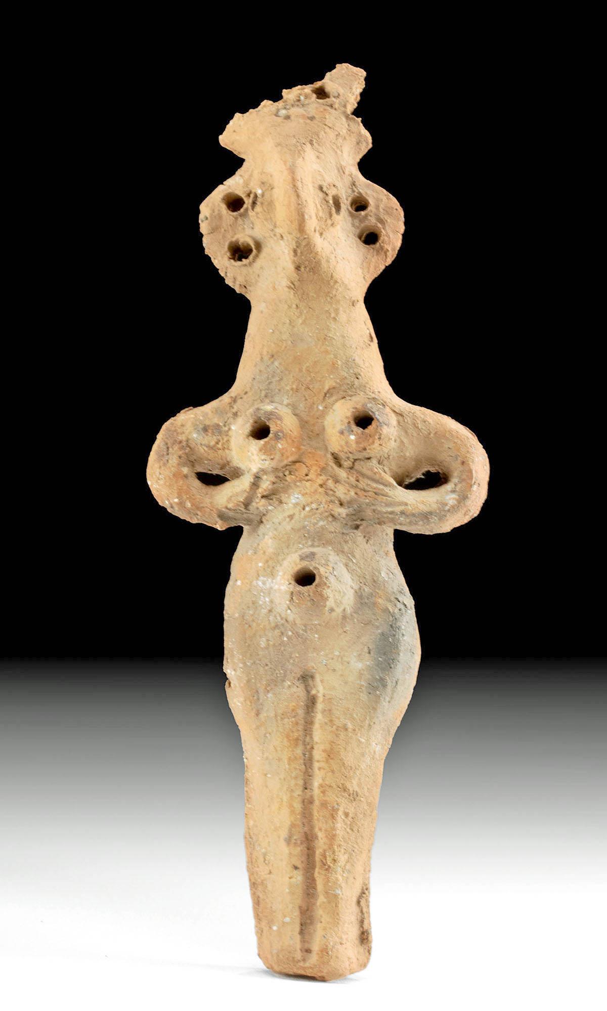Ancient Syro-Hittite Figure Nude Female Idol: Ancient Near East, Syria, Syro-Hittite, ca. 2750 BCE to 1900 BCE. A wondrous Syro-Hittite pillar figurine with mysterious eyes and a bird-like presence, yet the monolithic body and hourglass physique 