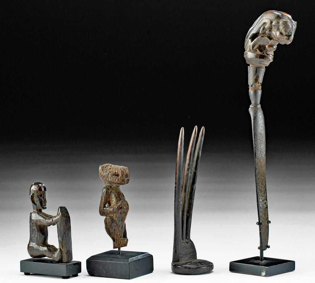 19th C. Indonesian Dayak Tools & Charms (4): Southeast Asia, Indonesia, Timor & Borneo, Dayak, ca. 19th century CE. A fine collection of 4 hand carved wooden, bovine bone, and iron tools and figurines. The first is a hand-carved wooden betel nut