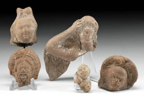 2 Roman + 3 Greek Hellenistic Terracotta Artifacts: **First Time At Auction** Greece, Hellenistic Period, ca. 3rd to 1st century BCE; Roman, Imperial Period, ca. 1st to 4th century CE. A selection of 3 Greek and 2 Roman terracotta artifact fragments.