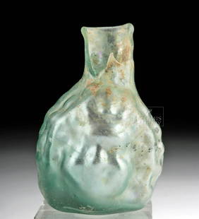 Roman Glass Janus- Headed Vessel - Bacchus: **Originally Listed At $250** Roman, Sidonian, ca. 2nd to 4th century CE. A fine Janus-headed miniature mold-blown glass vessel representing two heads of a boy - perhaps a young Bacchus with bunches o