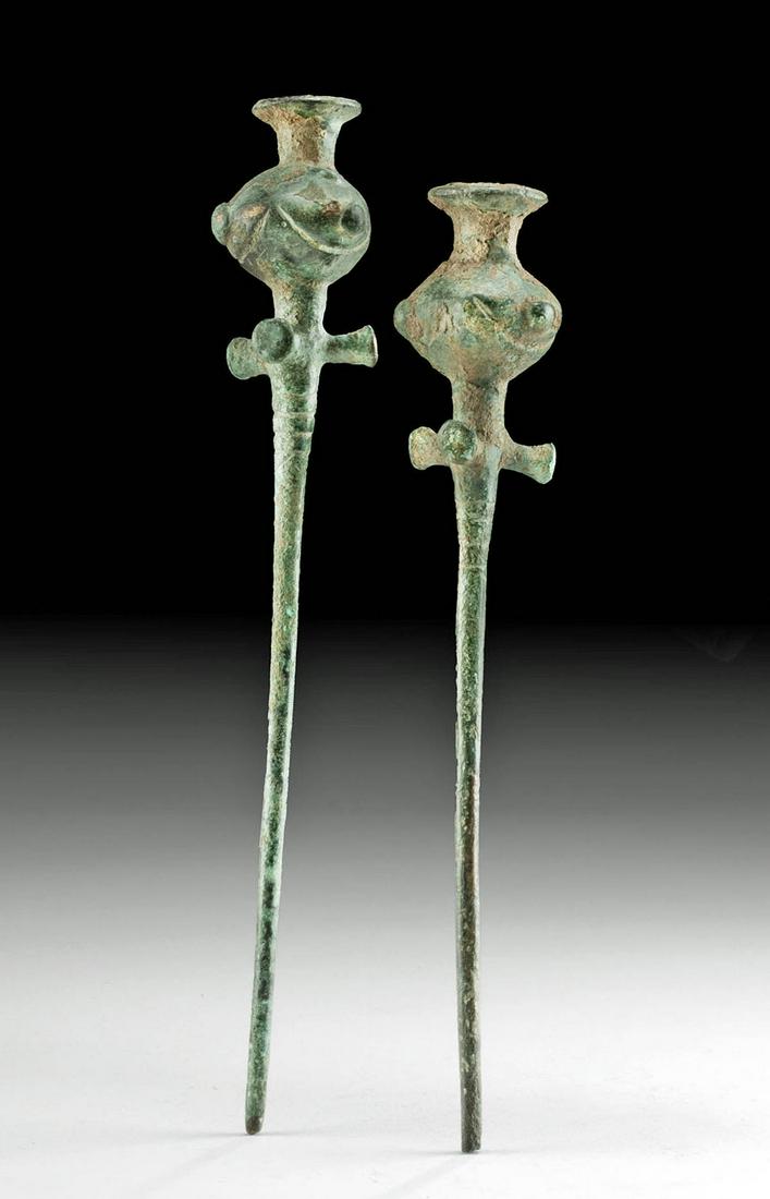 Luristan Bronze Cloak Pins Poppy Finials (pr): **Originally Listed At $400** Ancient Near East, Northwestern Iran to Southeastern Turkey, Luristan culture, ca. 1000 to 600 BCE. A set of 2 bronze cloak pins cast via the lost wax (cire perdue) techn