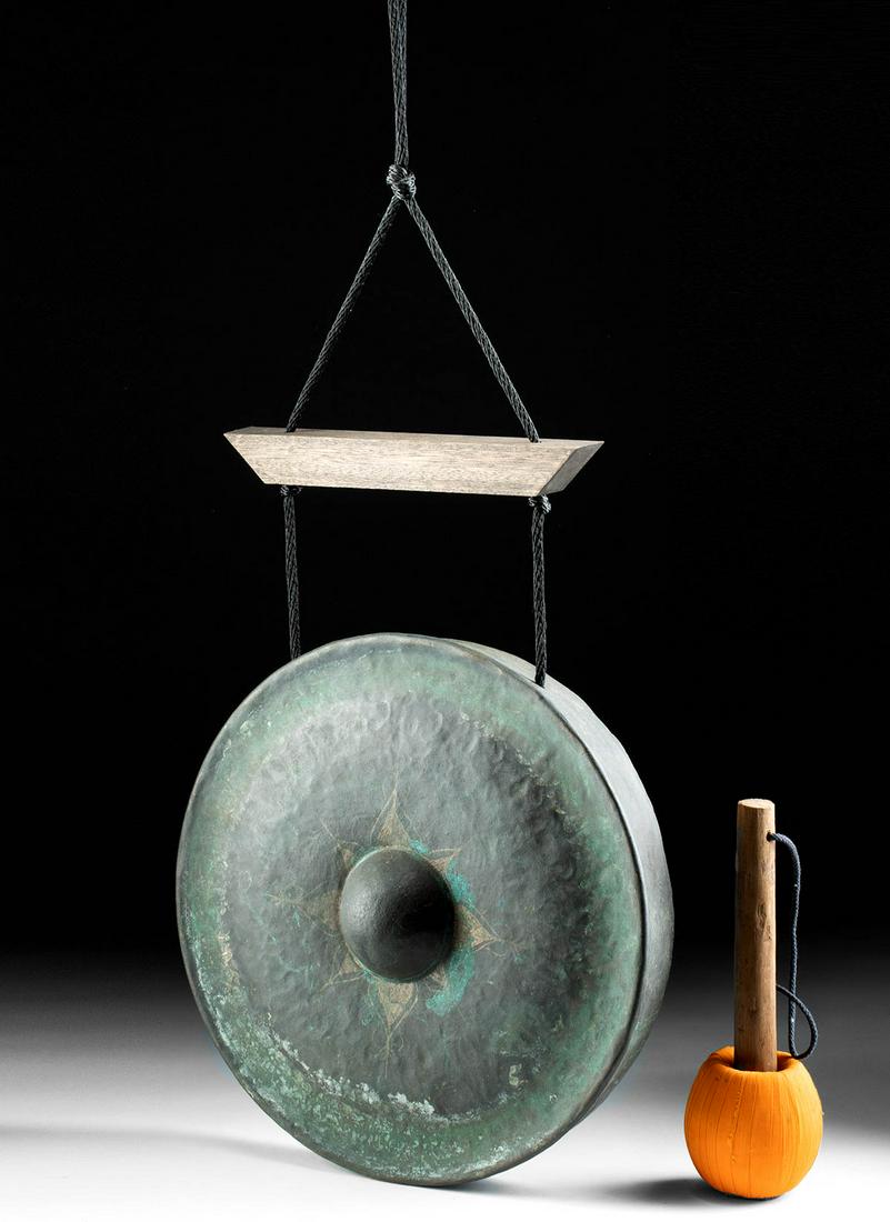 19th C. Burmese Bronze Temple Gong + Mallet: **Originally Listed At $350** Southeast Asia, Burma, ca. 19th century CE. A fine and playable example of bronze nipple gong boasting a lotus flower lightly incised into the patina around the raised "n