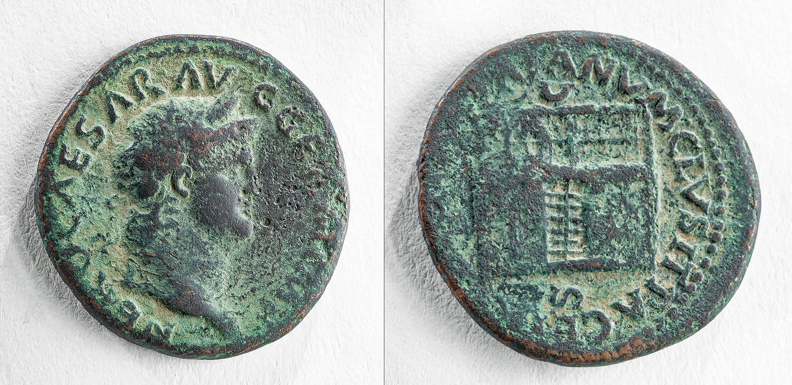 Roman Nero Bronze As Coin - 11.6 g: **First Time At Auction** Roman, Imperial Period, Nero, ca. 54 to 68 CE. AE As. Rome Mint. Obverse: Laureate head facing right. Reverse: Temple of Janus with door closed. RIC 300. Size: 1.05" W (2.7 c