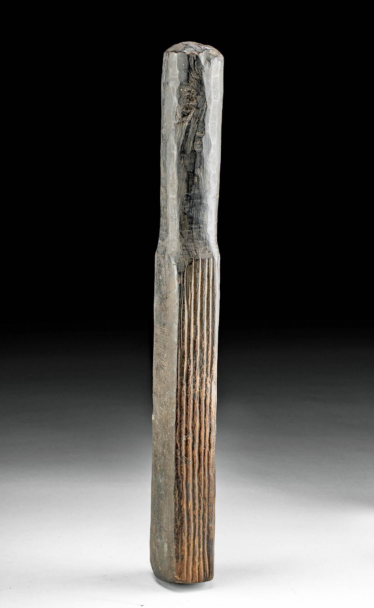 Late 19th C. Fijian Wood Tapa Beater: **Originally Listed At $350** South Pacific, Fiji, ca. late 19th to early 20th century CE. A hand-carved wooden tapa beater with four faces - one of which features incised vertical grooves that furthe