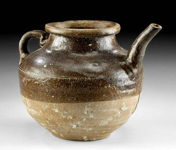 13th C. Thai Sukhothai Glazed Pottery Kendi: **Originally Listed At $350** Southeast Asia, Thailand, Sukhothai period, ca. 13th century CE. A fine pottery pitcher known as a kendi presenting a bulbous body, a slanted shoulder, a tapered neck, an