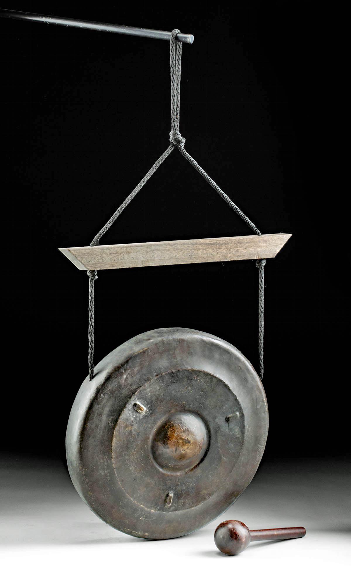 19th C. Burmese Brass Meditation Gong +Wood Mallet: **Originally Listed At $300** Southeast Asia, Burma, ca. 19th to early 20th century CE. A handsome and playable brass gong of massive form hanging from a mahogany wood and rope framework, accompanied 
