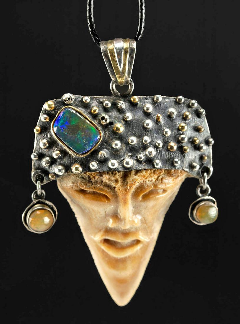 Silver Pendant w/ Fossilized Shark Tooth, Black Opal: Latin America, Mexico, ca. 20th to 21st century CE. A unique pendant made from a fossilized shark tooth carved into a face set into a modern high quality 89% silver setting inlaid with an opal, and fi