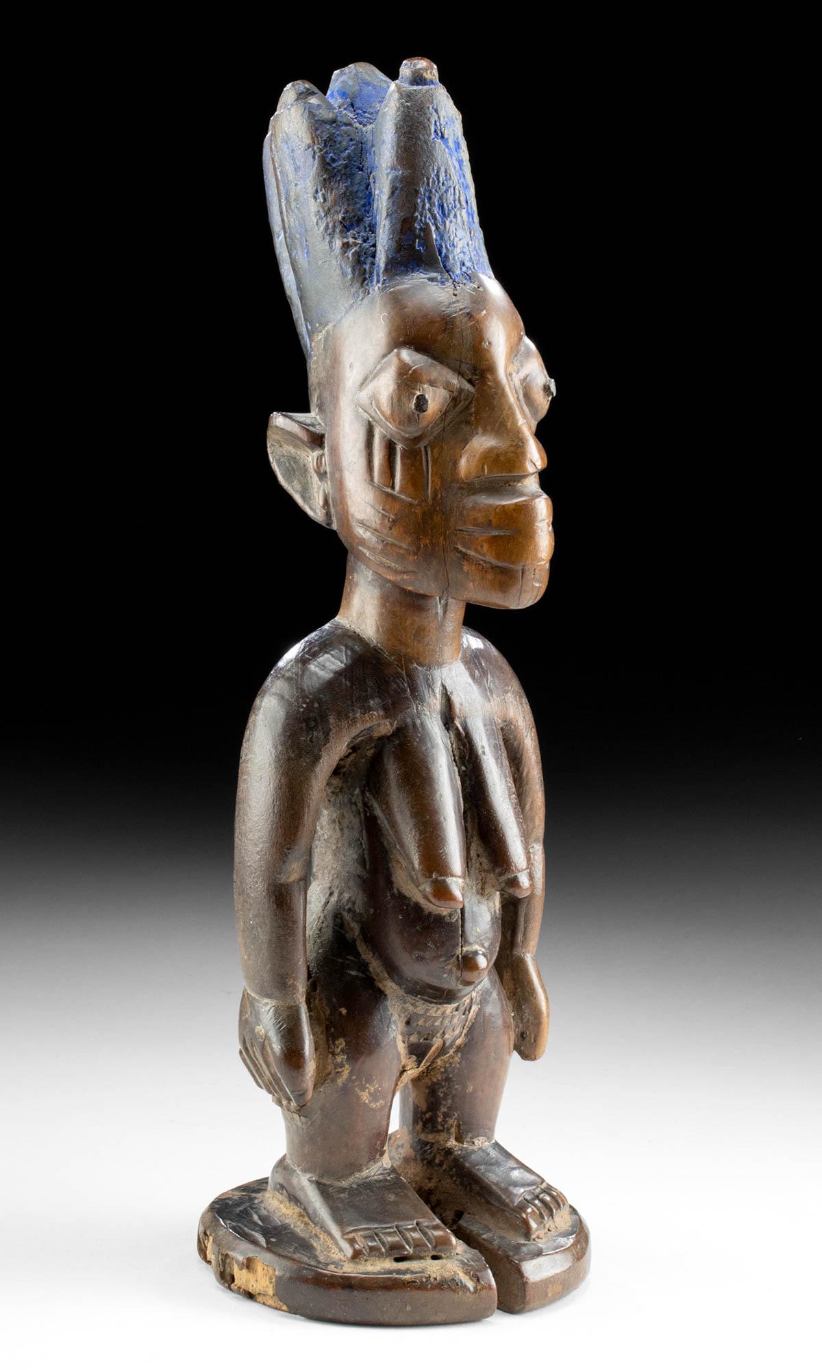 20th C. African Yoruba Wood Ibeji Figure Nude Female: **Originally Listed At $400** West Africa, Nigeria, Yoruba, ca. early to mid-20th century CE. A hand-carved wooden nude standing female figure, known as an ere ibeji, that traditionally comes in a pai