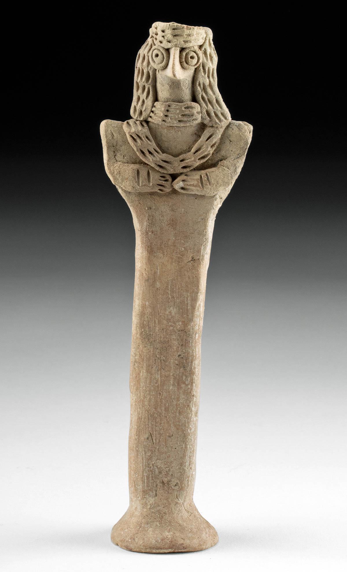 Ancient Syrian Standing Female Figure, TL Tested: Ancient Near East, Northern Syria, Syrian culture, ca. mid-3rd millennium BCE. A hand-built pottery idol of characteristically abstract form depicting a female goddess standing atop fused columnar leg