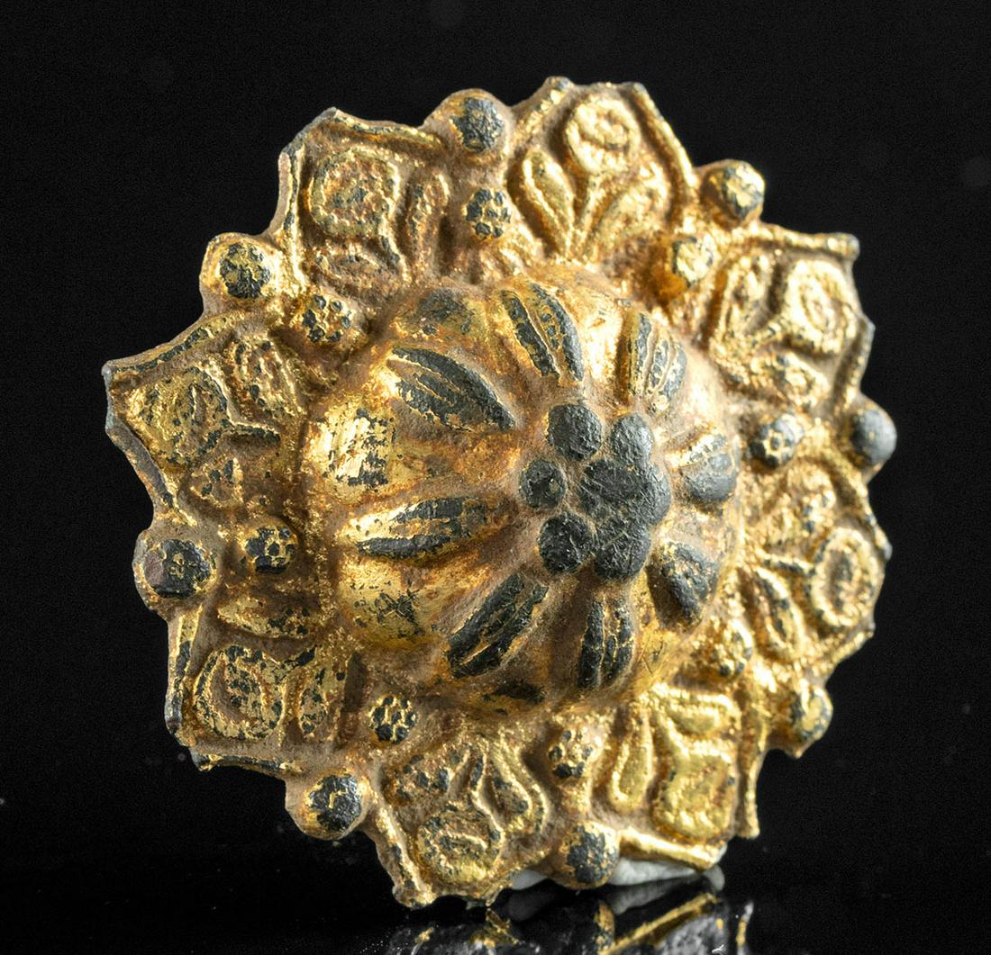 18th C. European Gilt Copper Floral Applique: Western Europe, Neoclassical period, ca. 18th century CE. A stunning gilt copper applique of a floral form and mesmerizing design of flowers within flowers within flowers. The convex midsection presen
