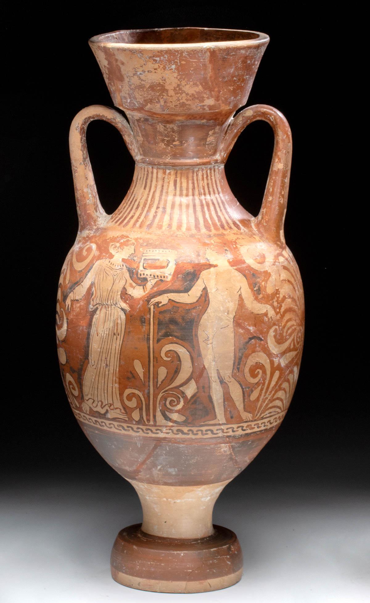 Greek Apulian Red-Figure Amphora, Ephebes & Lady: Magna Graecia, Southern Italy, Apulia, ca. 350 to 300 BCE. A beautiful terracotta amphora intricately decorated with red-figure imagery of 2 draped ephebes in conversation on one side, and a female wi