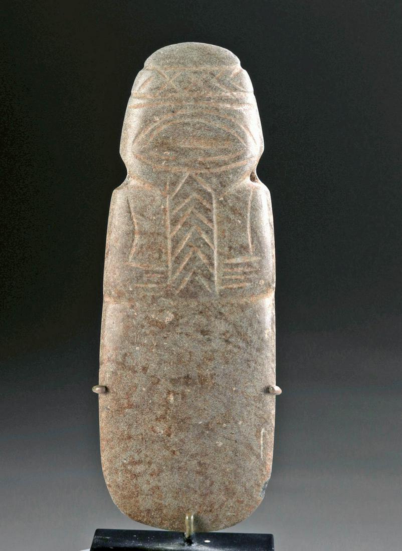 Nicoya Greenstone Axe God Pendant, ex-Arnovick: Pre-Columbian, Central America, Costa Rica, Nicoya region, ca. 200 to 600 CE. A hand-carved greenstone axe god pendant, so called because scholars believe these figures were carved from repurposes axe