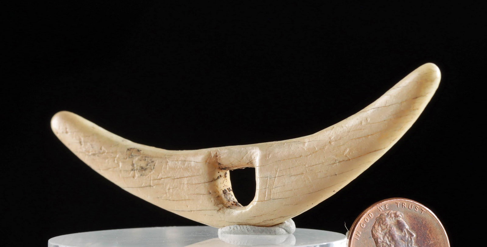 19th C. Inuit Walrus Ivory Toggle (Sewing Kit): Native American / First Nations, Northwest Coast United States, Alaska or Canada, Inupiaq / Inuit people, ca. 19th to early 20th century CE. A carved crescent shaped toggle made from a piece of walrus