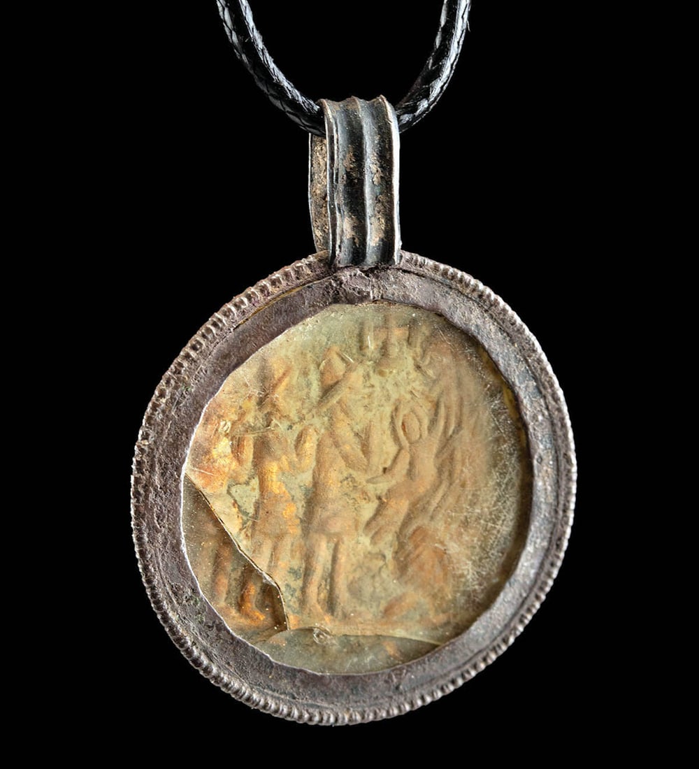 Byzantine Gold Pilgrim Pendant, Christ & Magi: **First Time At Auction** Western Europe / Near East, Byzantine to Medieval period, ca. 7th to 14th century CE. A silver pendant setting inlaid with a gold medallion depicting a Biblical scene under g