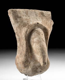 Large / Impressive Roman Plaque, Disembodied Phallus: Roman, Imperial Period, ca. 1st to 4th century CE. A sizable example of a mold-formed pottery plaque depicting a conical phallus and a set of testicles below the lower pubic region. Disembodied phalli