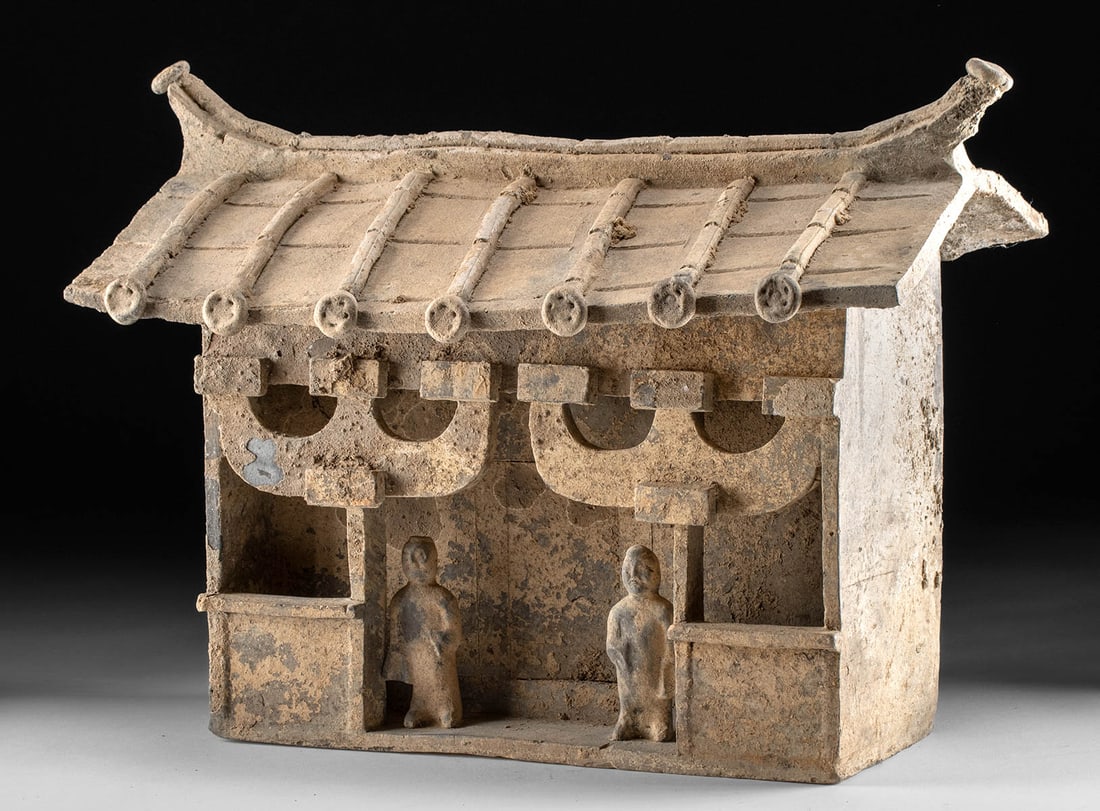Chinese Han Dynasty Pottery Altar Building: **Originally Listed At $1500** East Asia, China, Han Dynasty, ca. 206 BCE to 220 CE. A hand-built pottery model of an altar building with a tiled roofline denoted with incised striations. The front fe