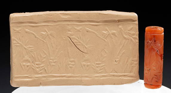 Mesopotamian Carnelian Cylinder Seal w/ Animals: Ancient Near East, Mesopotamia, Sumer, ca. 3100 to 2900 BCE. A hand-carved carnelian stamp seal of cylindrical form with a series of abstract yet charming zoomorphic creatures engraved around the circ