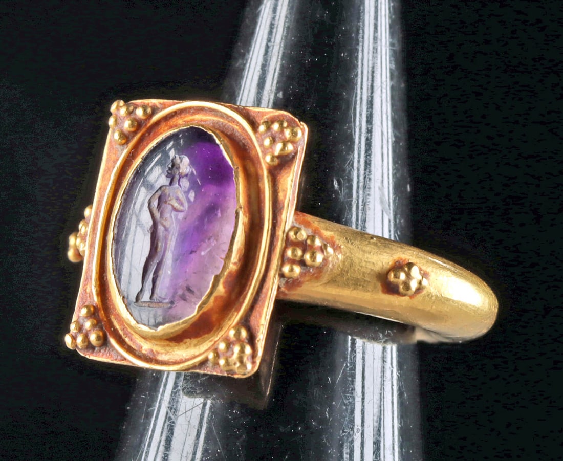1st C. Roman Gold Ring, Amethyst Intaglio Venus Pudica: Bid with Confidence - Trust the Artemis Advantage: - 25+ years’ experience selling ancient and ethnographic art - Ancient items have been legally acquired, and are legal to sell - Accurate descripti