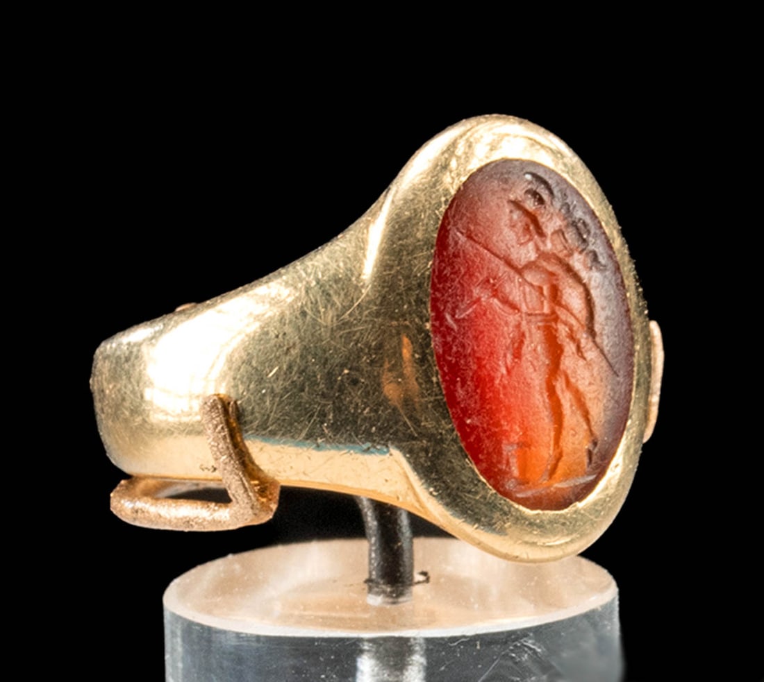 18K Gold Ring w/ Roman Carnelian Intaglio of Soldier: Bid with Confidence - Trust the Artemis Advantage: - 25+ years’ experience selling ancient and ethnographic art - Ancient items have been legally acquired, and are legal to sell - Accurate descripti
