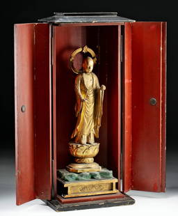 Japanese Meiji Gilt Wood Zushi Shrine of Jizo Bosatsu: East Asia, Japan, Meiji era, ca. late 19th to early 20th century CE. A beautiful, lacquered wood zushi shrine with a gilt wood statue within of Jizo Bosatsu bodhisattva, standing on a lotus pedestal