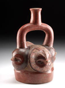 Chavin Stirrup Vessel w/ Owl Heads, TL'd: **Originally Listed At $2500** Pre-Columbian, Peru, north coast, Chavin, ca. 1200 to 500 BCE. An attractive yet unique pottery stirrup vessel featuring the heads of 4 owls protruding outward, each